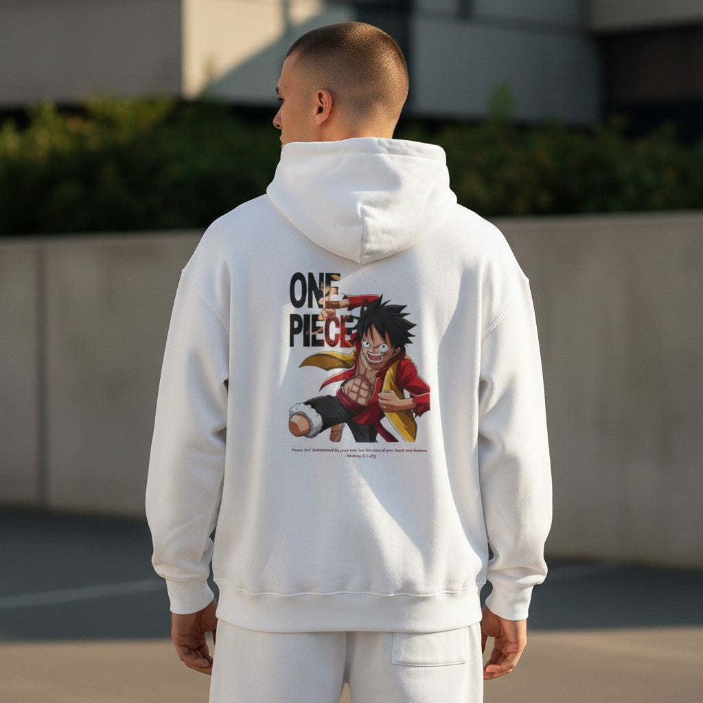 CanvasPrismatique white One Piece Luffy graphic hoodie worn by a man, showing a dynamic character print on the back.
